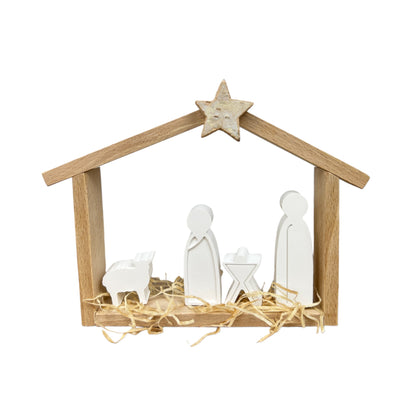 Christmas nativity scene in the wooden stable